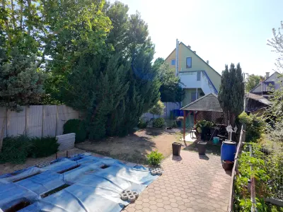 Dunaharasztin eladó emeleti + tetőtéri lakás saját kerttel, medencével és garázzsal – 27. kép